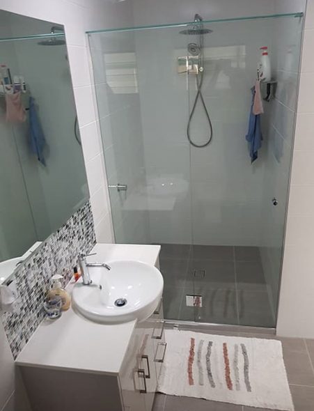 White Tiled Bathroom — Wilkinson Homes Pty Ltd in Annandale, QLD